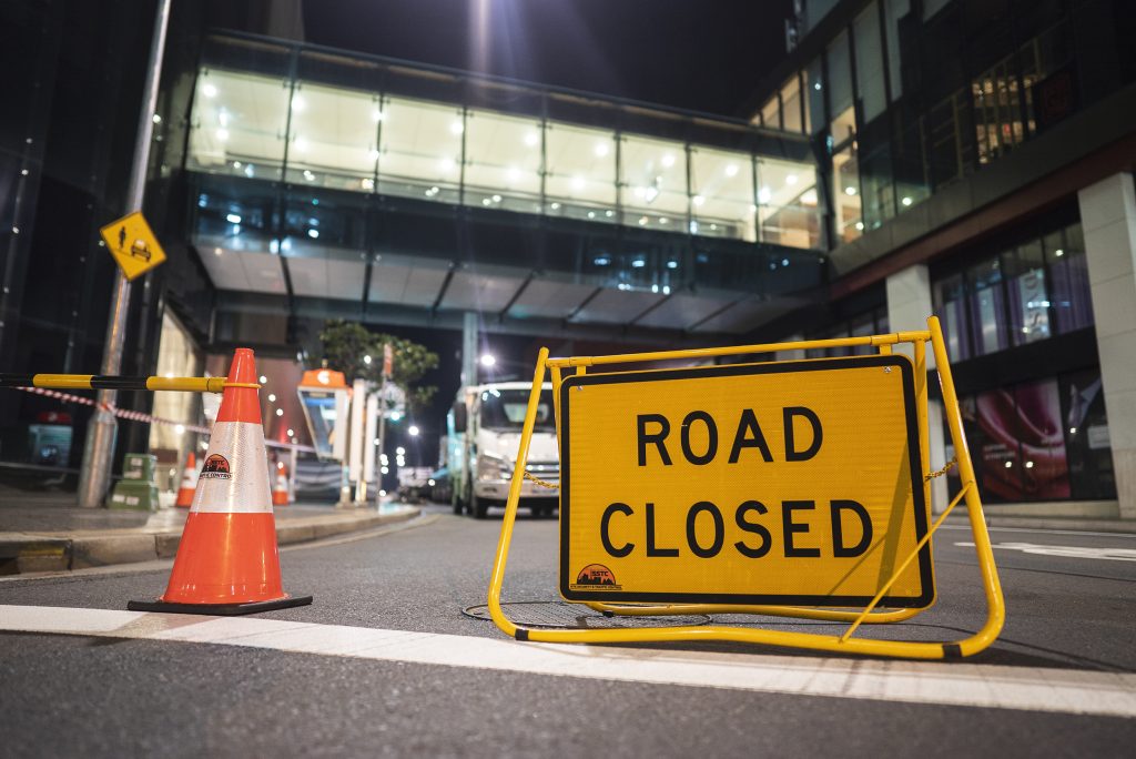A road closed sign and other traffic control equipment set up by SSTC.