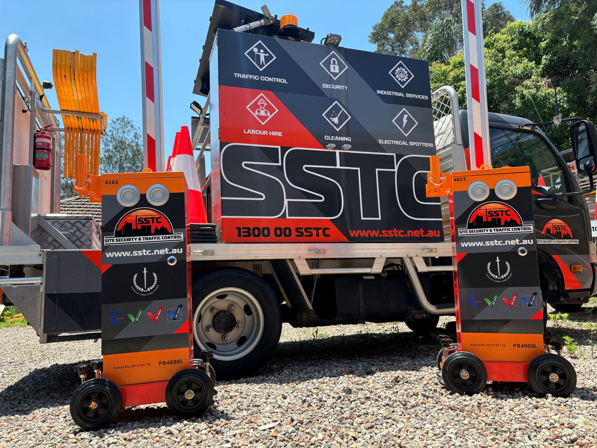 SSTC automated perimeter access control barriers and branded site security vehicle in Sydney